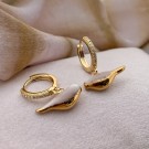 VERDIFUGL PUDDERROSA DYPPET I GULL thumbnail